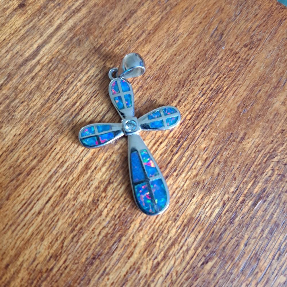 Silver and opalescent cross